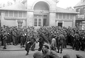 British troops outside the bath house in a Normandy town in Northern France shor British troops outside the bath house in a Normandy town in Northern France shor