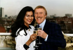 Bruce Forsyth, comedian and Game Show host, with his wife Wilnelia Bruce Forsyth, comedian and Game Show host, with his wife Wilnelia