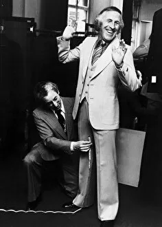 Images Dated 9th May 1976: Bruce Forsyth Entertainer being measured up for a new suit
