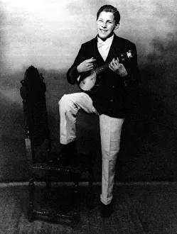 Bruce Forsyth as a teenager playing a ukulele circa 1945 Bruce Forsyth as a teenager playing a ukulele circa 1945