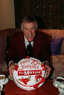 Bruce Forsyth TV Presenter February 98 Holding a birthday cake given to him by Bruce Forsyth TV Presenter February 98 Holding a birthday cake given to him by