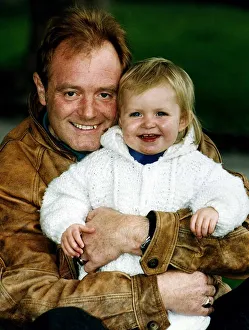 Bruce Jones milkman and actor the star of Raining Stones with his granddaughter Sophie Bruce Jones milkman and actor the star of Raining Stones with his granddaughter Sophie