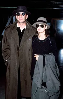 Bruce Willis with his wife Demi Moore pictured arriving at London Heathrow Airport Bruce Willis with his wife Demi Moore pictured arriving at London Heathrow Airport