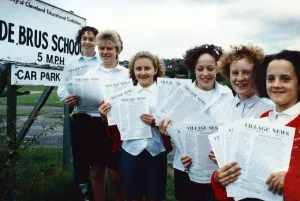 De Brus School pupils with their community newsletter - left to right, Louise Calvert De Brus School pupils with their community newsletter - left to right, Louise Calvert