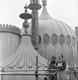 Builders who are involved in the restoration of Brighton Pavilion seen here on the roof Builders who are involved in the restoration of Brighton Pavilion seen here on the roof