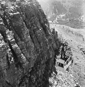 The cable car carrying tourist to the summit of Table Mountain which over looks Cape Town The cable car carrying tourist to the summit of Table Mountain which over looks Cape Town