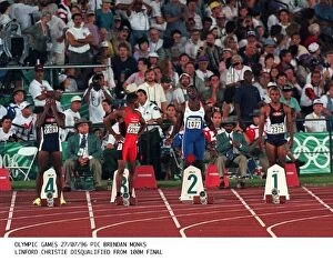 Images Dated 27th July 1996: Canadas Donovan Bailey crosses the finish line to take the Gold medal in the mens