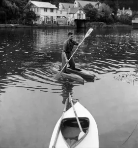 Canoeist Dave Pegram testing his water boots invention on the river Canoeist Dave Pegram testing his water boots invention on the river