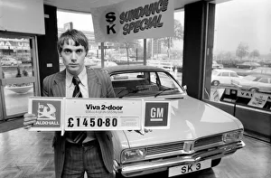 A car dealer putting cars on sale in his garage forecourt in Brighton. May 1975 A car dealer putting cars on sale in his garage forecourt in Brighton. May 1975
