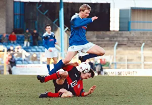 Cardiff City v Colchester United. Gareth Stoker of Cardiff jumps over a Colchester player Cardiff City v Colchester United. Gareth Stoker of Cardiff jumps over a Colchester player