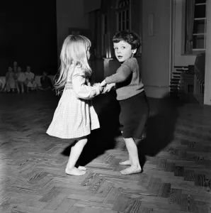 Would you care for the next dance? Infant schoolchildren playing during a dance Would you care for the next dance? Infant schoolchildren playing during a dance