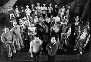 The cast of Aladdin with director Peter Roberts (centre The cast of Aladdin with director Peter Roberts (centre