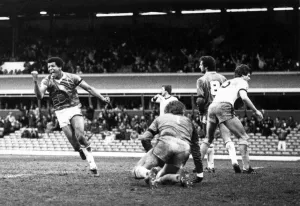 Celebrations, Howard Gayle turns away in triumph after completing Blues' Celebrations, Howard Gayle turns away in triumph after completing Blues'