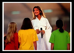 Celine Dion at Murrayfield Edinburgh July 1999 White kimoni, holding microphone Celine Dion at Murrayfield Edinburgh July 1999 White kimoni, holding microphone