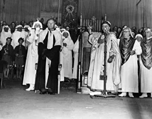 The chaired bard, T Llew Jones of Llandysul, stands while the sword of peace ceremony is The chaired bard, T Llew Jones of Llandysul, stands while the sword of peace ceremony is
