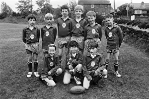 We are the champions... Scholes Junior and Infants School under-nine rugby team won We are the champions... Scholes Junior and Infants School under-nine rugby team won