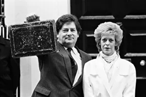 Images Dated 19th March 1985: Chancellor of the Exchequer Nigel Lawson outside 11 Downing Street with his wife Therese