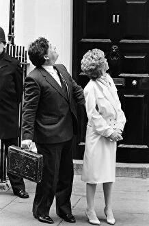 Images Dated 19th March 1985: Chancellor of the Exchequer Nigel Lawson and his wife Therese look up at their children