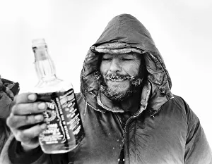 Charles Burton North Pole Expedition takes a rest with a drink from a bottle of Jack Charles Burton North Pole Expedition takes a rest with a drink from a bottle of Jack