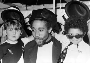 Charlie Anderson, guitarist with The Selector, joined children on a Two-Tone float during Charlie Anderson, guitarist with The Selector, joined children on a Two-Tone float during