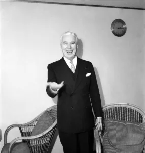 Charlie Chaplin being interviewed during his trip to the United Kingdom Charlie Chaplin being interviewed during his trip to the United Kingdom