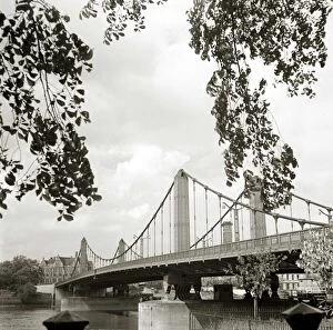Images Dated 15th December 1985: Chelsea bridge London Bridge over the river water Framed by leafy trees