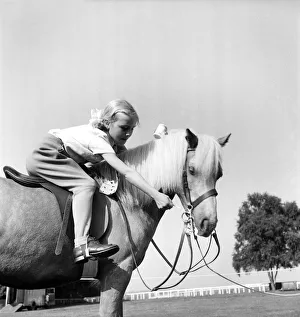 Children: Animals. Welsh Pony gets reward. 6 year old Mary Peddie of Tring sharing her Children: Animals. Welsh Pony gets reward. 6 year old Mary Peddie of Tring sharing her