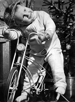Children: Boy bicycle. December 1952 P024401 Children: Boy bicycle. December 1952 P024401