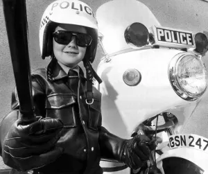Children - Boys Young Hugh Keith, dressed up as motor bike Police Patrolman Children - Boys Young Hugh Keith, dressed up as motor bike Police Patrolman