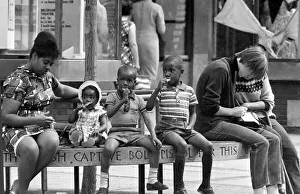 Children eating ice creams in Coventry's Precinct shopping centre Children eating ice creams in Coventry's Precinct shopping centre
