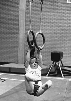 Images Dated 1st May 1977: Children Gymnastics Swinging toddler in Lewisham gym is allowed to play