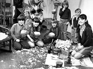 These children are making turnip lanterns, masks and a dragon for Halloween in October These children are making turnip lanterns, masks and a dragon for Halloween in October
