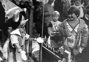 Children meet Pinocchio through the window of the Fenwick store in Newcastle Children meet Pinocchio through the window of the Fenwick store in Newcastle