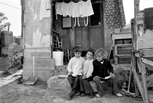 Children outside their home in a poor suburb on the outskirts of Rome Children outside their home in a poor suburb on the outskirts of Rome