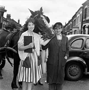 Children petition to save milkmans house: Jennifer here collects a signature in a street Children petition to save milkmans house: Jennifer here collects a signature in a street