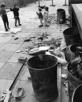 Images Dated 8th April 1974: Children playing amongst the rubbish and debris in Halewood, Liverpool