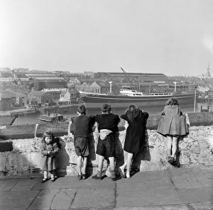 Children at the River Wear, County Durham, on which many ships have been built Children at the River Wear, County Durham, on which many ships have been built