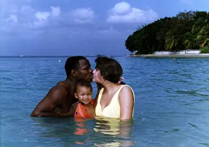 Chris Eubank Boxer in the sea in barbados with his wife Karron and son Chistopher Chris Eubank Boxer in the sea in barbados with his wife Karron and son Chistopher