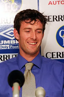 Chris Sutton, poses for the media during news press conference at Stamford Bridge after Chris Sutton, poses for the media during news press conference at Stamford Bridge after