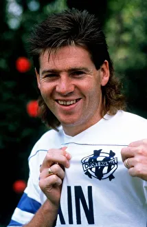 Chris Waddle shows off the Marseille badge after his transfer from Tottenham Hotspur for Chris Waddle shows off the Marseille badge after his transfer from Tottenham Hotspur for