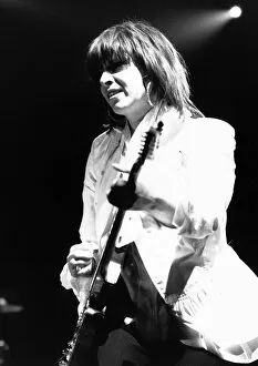 Images Dated 22nd May 1987: Chrissie Hynde singer with The Pretenders pop group 1987 playing guitar in concert