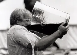 Christopher Biggins drinking from the largest glass of whisky in the world Christopher Biggins drinking from the largest glass of whisky in the world