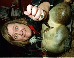 Images Dated 27th November 1996: Clarissa Dickson Wright from Two Fat Ladies TV programme gets stuck into Haggis
