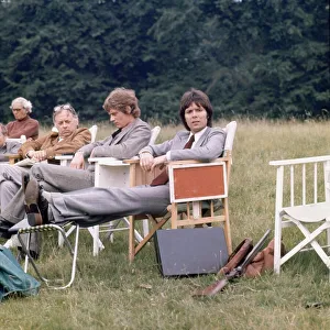 Cliff Richard and Anthony Andrews seen here relaxing between takes on location filming Cliff Richard and Anthony Andrews seen here relaxing between takes on location filming