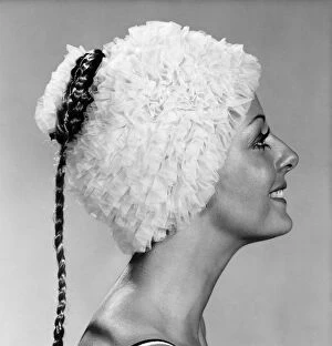 Images Dated 17th October 1970: Clothing : Beach. Woman models a frilly swimming hat. October 1970 P017299