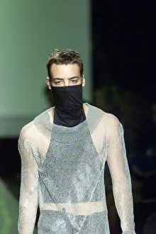 Clothing by Michiko Koshino 1998 modelled by male Model during London Fashion Week Clothing by Michiko Koshino 1998 modelled by male Model during London Fashion Week