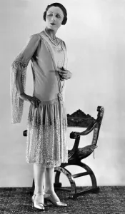 Clothing. This very pleasing evening gown is of pale cyclamen georgette and lace Clothing. This very pleasing evening gown is of pale cyclamen georgette and lace