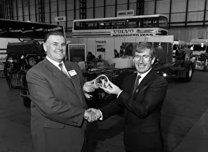 Coach company operator Harry Shaw (left) received the 15 Coach company operator Harry Shaw (left) received the 15
