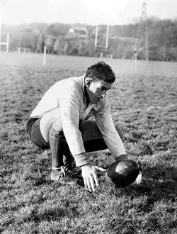 Colin Meads, New Zealand rugby player practising place kicking during a All Blacks Colin Meads, New Zealand rugby player practising place kicking during a All Blacks