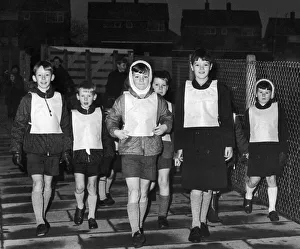 A colourful sight in the dark winter mornings is provided by these pupils of Grange Farm A colourful sight in the dark winter mornings is provided by these pupils of Grange Farm